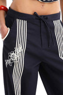 Agua Bendita Lila Varsity Pants detail