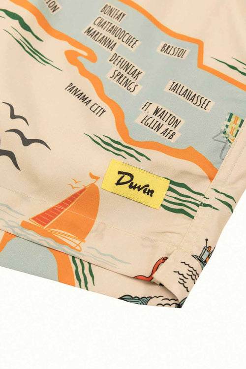 Map design with sailboat illustration and 'Duvin' label on a beige background