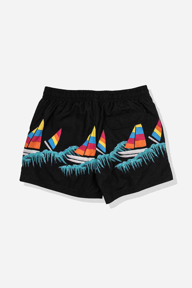 Black shorts with colorful sailboat design on a white background