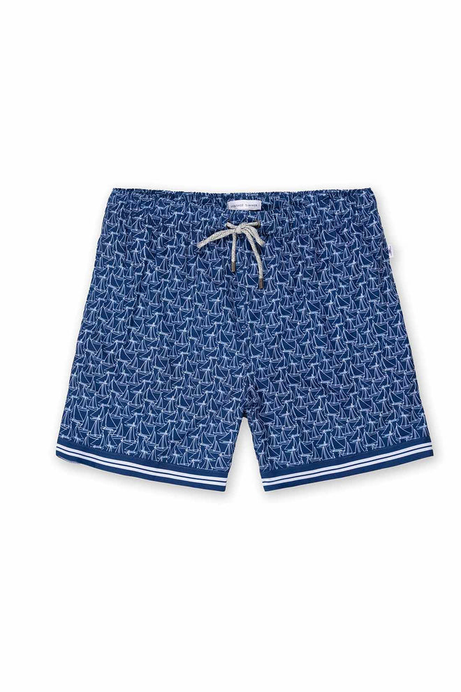 Blue swim shorts with white pattern on a white background