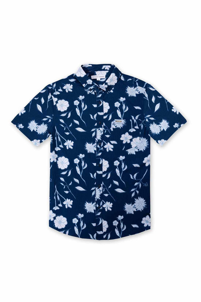 Navy blue shirt with white floral pattern on a white background