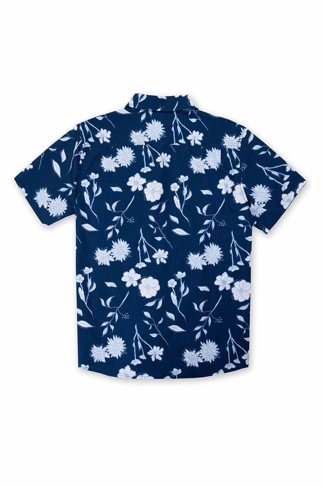 Navy blue shirt with white floral pattern on a white background