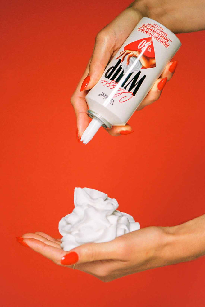 Vacation Classic Whip SPF 30 in hand