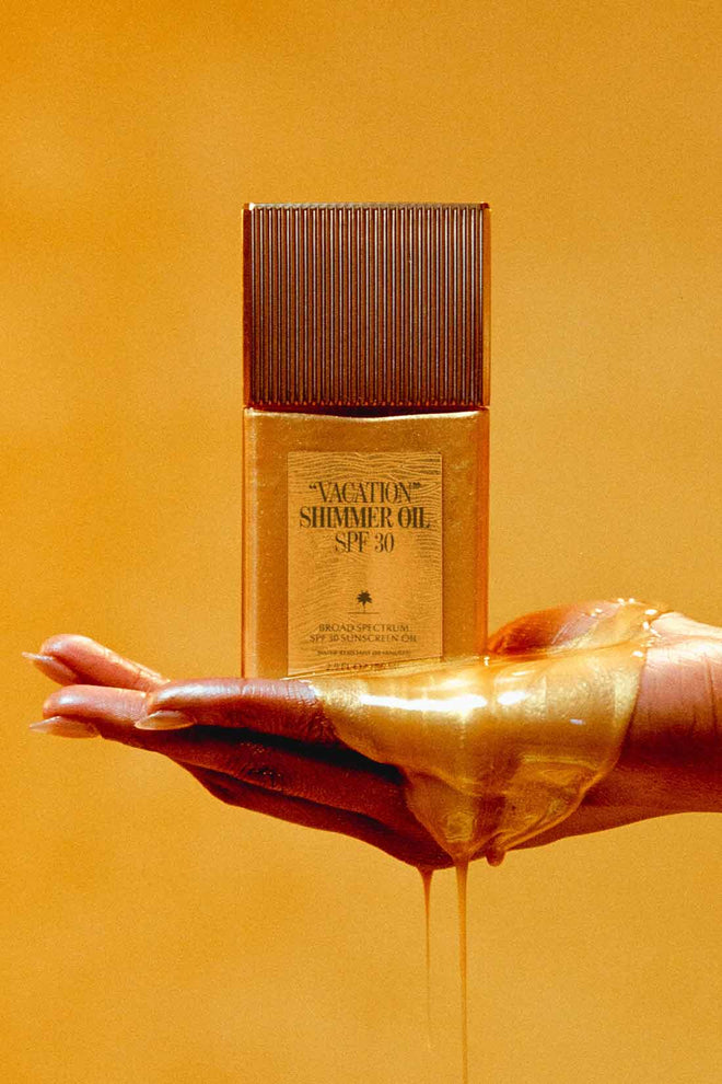 Vacation Shimmer Oil SPF 30 hand