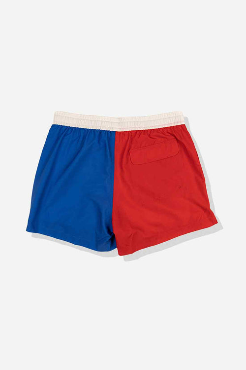 Red and blue shorts with a white waistband on a light gray background
